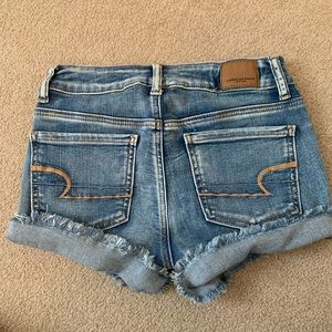 next level stretch jean shorts AE